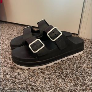 J/Slides Sandals in Black